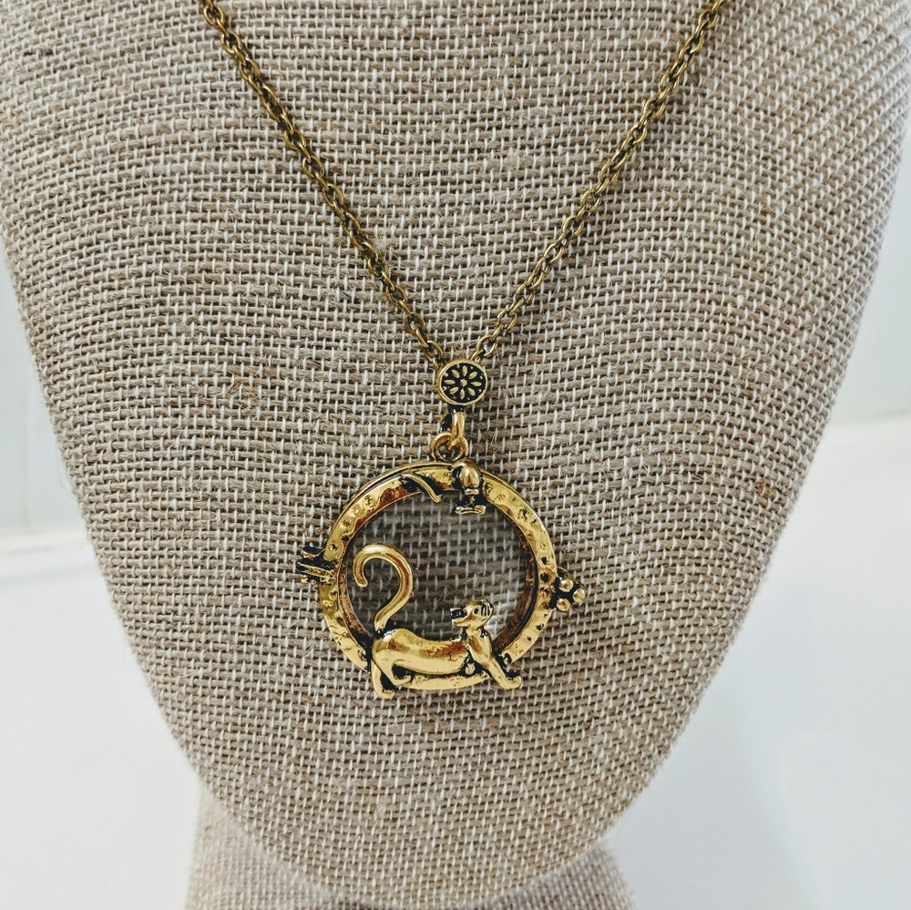 Gold cat and mouse magnifying glass locket